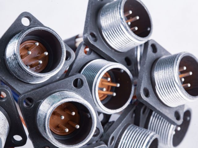 Close-up blurry metal sockets for plugs