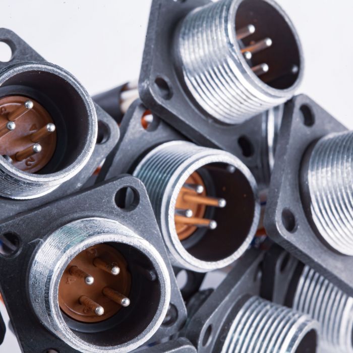 Close-up blurry metal sockets for plugs