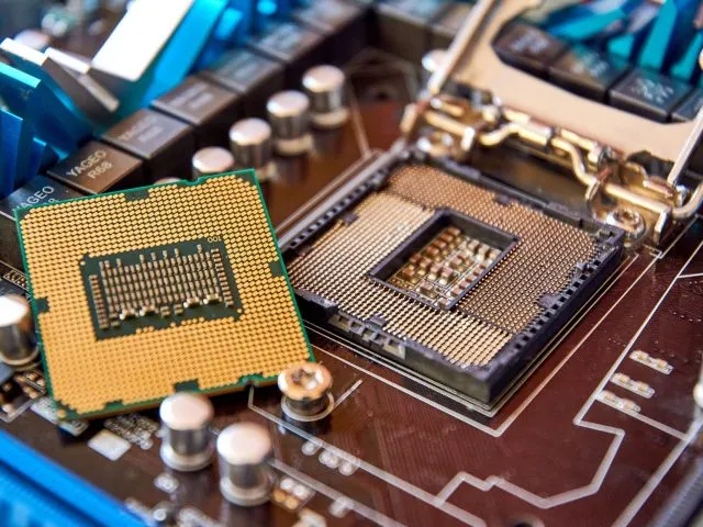 the motherboard processor is removed from above close up CPU