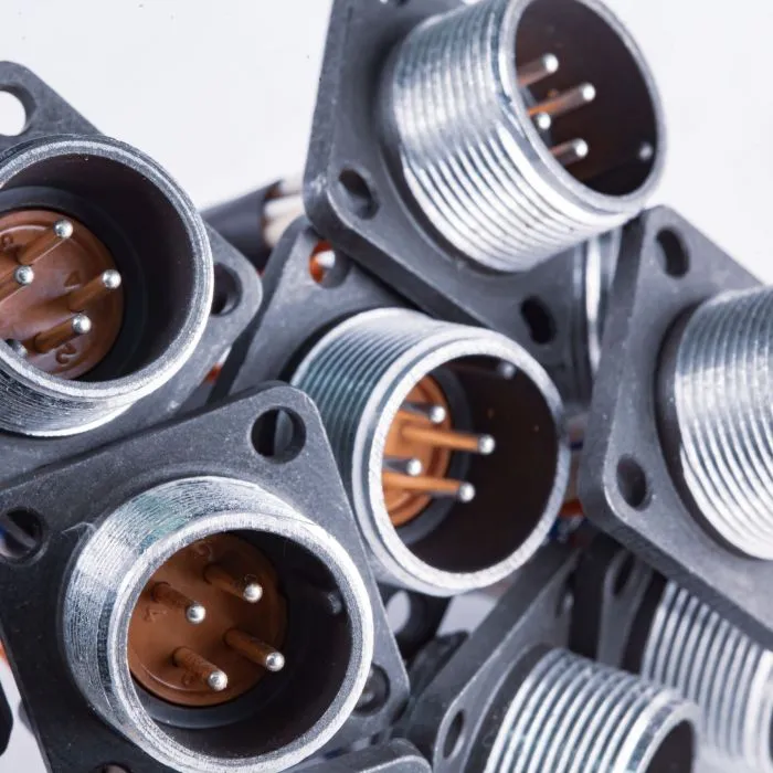 Close-up blurry metal sockets for plugs