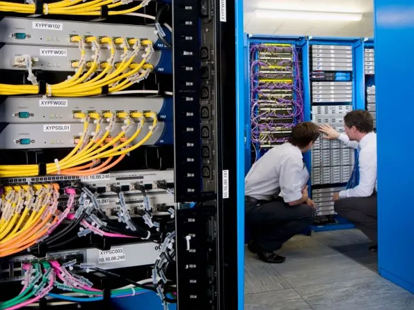 wide-shot-of-two-it-technicians-in-the-server-room-2026-01-11-08-38-02-utc
